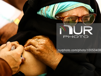 A woman recieves a dose of Vaccine during Hajj pilgrimage vaccination program in Sopore District Baramulla Jammu and Kashmir India on 16 May...