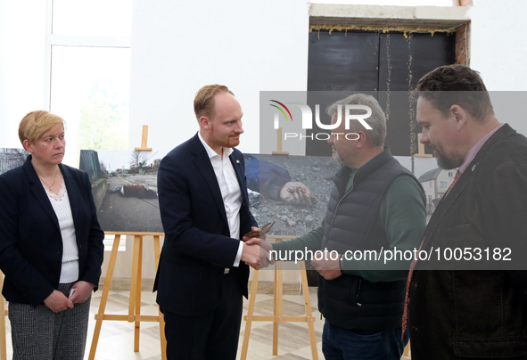 BUCHA, UKRAINE - MAY 16, 2023 - Bucha city head Anatolii Fedoruk (2nd R) shakes hands with MP Aron Emilsson who heads the the delegation of...