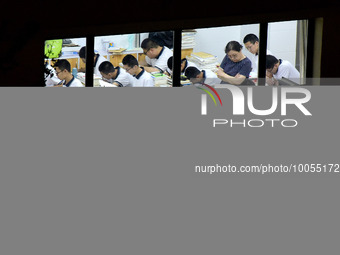 Students who are about to take the National College entrance examination review their lessons in a classroom at Fengfeng No 1 High School in...