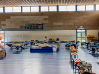 Cots for evacuees placed inside a school. Ravenna (Emilia - Romagna) , on May 18, 2023. The Grand Prix event in Imola, northern Italy, origi...
