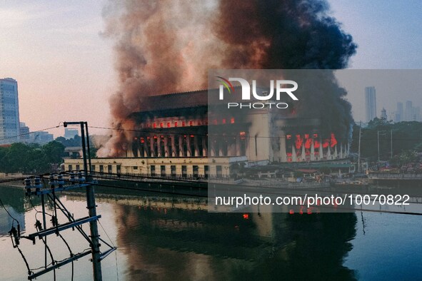 A huge fire engulfs Manila's Central Post Office in the Philippines on May 22, 2023. The historic building, originally built in 1926, suffer...