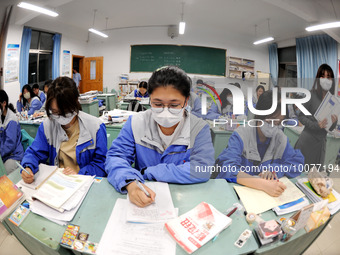  Students who are about to take the National College entrance examination (Gaokao) study in a classroom at Lianyungang Senior High School in...