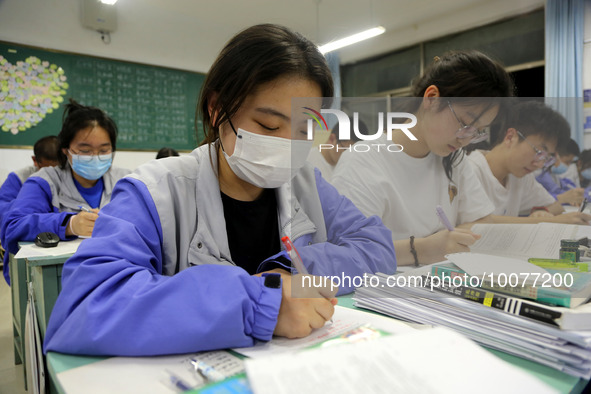  Students who are about to take the National College entrance examination (Gaokao) study in a classroom at Lianyungang Senior High School in...