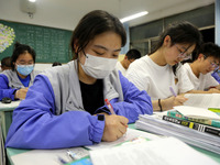  Students who are about to take the National College entrance examination (Gaokao) study in a classroom at Lianyungang Senior High School in...