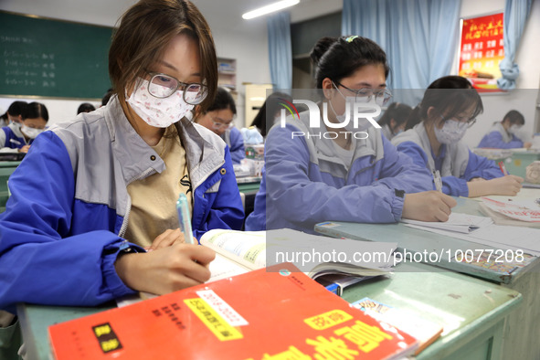  Students who are about to take the National College entrance examination (Gaokao) study in a classroom at Lianyungang Senior High School in...