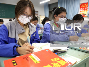  Students who are about to take the National College entrance examination (Gaokao) study in a classroom at Lianyungang Senior High School in...