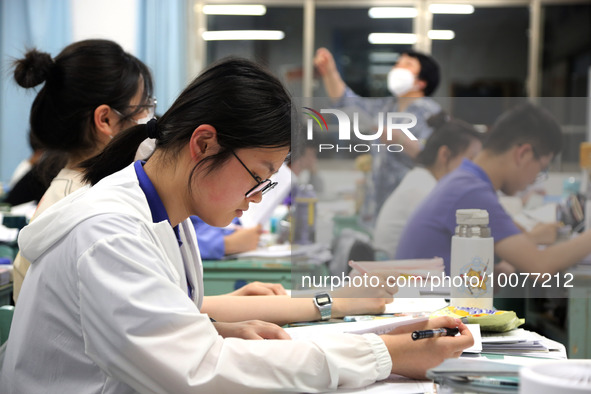  Students who are about to take the National College entrance examination (Gaokao) study in a classroom at Lianyungang Senior High School in...