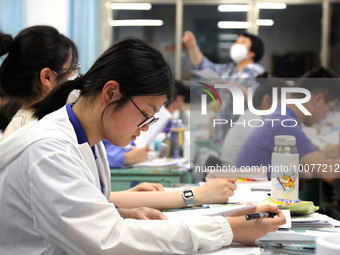  Students who are about to take the National College entrance examination (Gaokao) study in a classroom at Lianyungang Senior High School in...