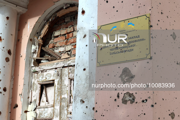 OKHTYRKA, UKRAINE - MAY 24, 2023 - Shrapnel holes dot the wall of a cultural centre damaged by Russian shelling, Okhtyrka, Sumy Region, nort...