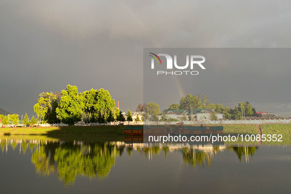 Rainbow appears after heavy rainfall in Srinagar, Indian Administered Kashmir on 25 May 2023. Rainfall will continue in the parts of Kashmir...