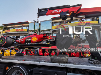 A car of Carlos Sainz of Ferrari is being transported to Ferrari garage after being crashed in Practice 2 ahead of the F1 Grand Prix of Mona...