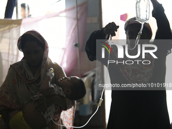 Al-Mahmud (3) is seen taking to the test lab for a blood test for dengue fever at a hospital in Dhaka, Bangladesh, on May 30, 2023. 
Accord...