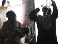 Al-Mahmud (3) is seen taking to the test lab for a blood test for dengue fever at a hospital in Dhaka, Bangladesh, on May 30, 2023. 
Accord...