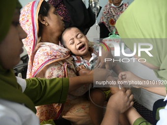 Al-Mahmud (3) getting a blood test for dengue fever at a hospital in Dhaka, Bangladesh, on May 30, 2023. 
According to media reports, The n...