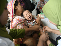 Al-Mahmud (3) getting a blood test for dengue fever at a hospital in Dhaka, Bangladesh, on May 30, 2023. 
According to media reports, The n...