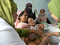 Al-Mahmud (3) getting a blood test for dengue fever at a hospital in Dhaka, Bangladesh, on May 30, 2023. 
According to media reports, The n...