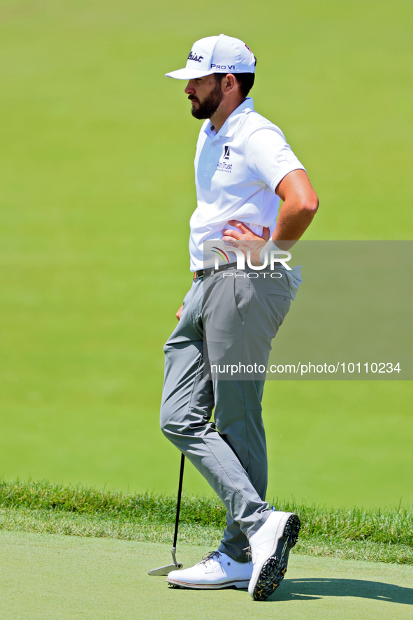 Hayden Buckley of Tupelo, MS waits on  the 18th green during the first round of the The Memorial Tournament presented by Workday at Muirfiel...