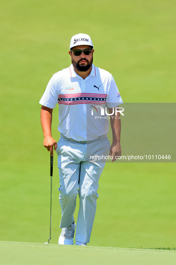 J.J. Spaun of Scottsdale, Arizona walks onto the 18th green during the first round of the The Memorial Tournament presented by Workday at Mu...