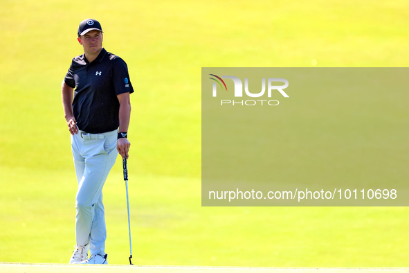 Jordan Spieth of Dallas, Texas waits on the 18th green during the first round of the The Memorial Tournament presented by Workday at Muirfie...