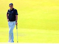 Jordan Spieth of Dallas, Texas waits on the 18th green during the first round of the The Memorial Tournament presented by Workday at Muirfie...