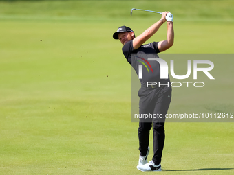 Danny Willett of Sheffield, England hits from the 17th green during the first round of the The Memorial Tournament presented by Workday at M...