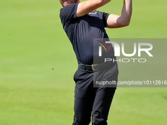 Danny Willett of Sheffield, England hits from the 17th green during the first round of the The Memorial Tournament presented by Workday at M...