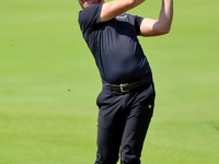 Danny Willett of Sheffield, England hits from the 17th green during the first round of the The Memorial Tournament presented by Workday at M...