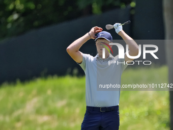 Cam Davis of Sydney, Australia reacts to his fairway shot during the first round of the The Memorial Tournament presented by Workday at Muir...