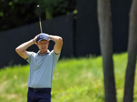 Cam Davis of Sydney, Australia reacts to his fairway shot during the first round of the The Memorial Tournament presented by Workday at Muir...