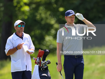 Cam Davis of Sydney, Australia looks down the 15thh fairway before hitting during the first round of the The Memorial Tournament presented b...