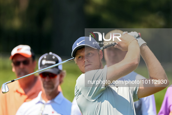 Cam Davis of Sydney, Australia hits from the 16th tee during the first round of the The Memorial Tournament presented by Workday at Muirfiel...