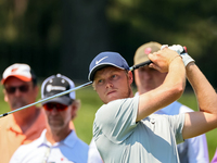 Cam Davis of Sydney, Australia hits from the 16th tee during the first round of the The Memorial Tournament presented by Workday at Muirfiel...