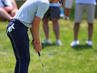 Cam Davis of Sydney, Australia putts on the 16th green from the bunker during the first round of the The Memorial Tournament presented by Wo...