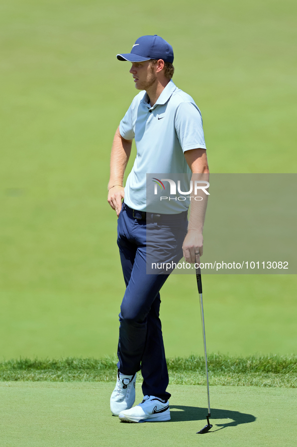 Cam Davis of Sydney, Australia waits on the 18th green  from the bunker during the first round of the The Memorial Tournament presented by W...