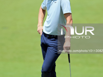 Cam Davis of Sydney, Australia waits on the 18th green  from the bunker during the first round of the The Memorial Tournament presented by W...