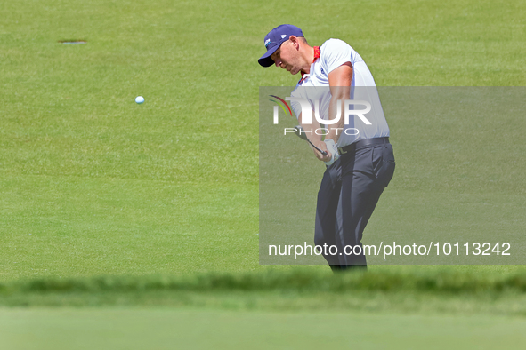 Matt Wallace of England hits onto the 18th green during the first round of the The Memorial Tournament presented by Workday at Muirfield Vil...