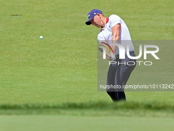 Matt Wallace of England hits onto the 18th green during the first round of the The Memorial Tournament presented by Workday at Muirfield Vil...