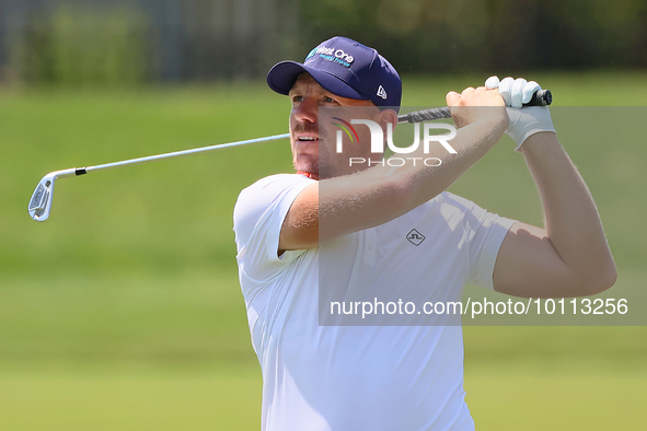 Matt Wallace of England follows his shot on the 17th fairway during the first round of the The Memorial Tournament presented by Workday at M...