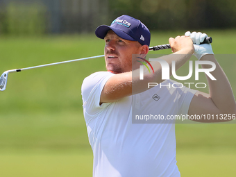 Matt Wallace of England follows his shot on the 17th fairway during the first round of the The Memorial Tournament presented by Workday at M...