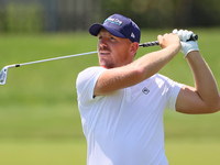 Matt Wallace of England follows his shot on the 17th fairway during the first round of the The Memorial Tournament presented by Workday at M...