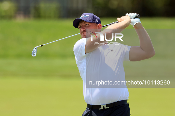 Matt Wallace of England hits from the fairway during the first round of the The Memorial Tournament presented by Workday at Muirfield Villag...