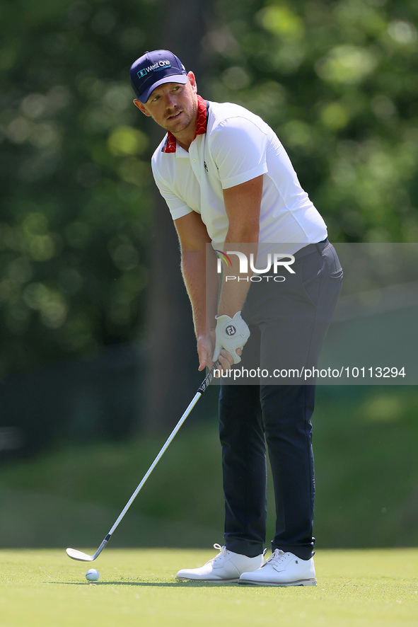 Matt Wallace of England holds prepares to hit from the 15th fairway during the first round of the The Memorial Tournament presented by Workd...