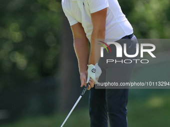 Matt Wallace of England holds prepares to hit from the 15th fairway during the first round of the The Memorial Tournament presented by Workd...