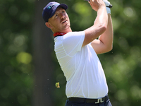 Matt Wallace of England hits from the 15th fairway to the green during the first round of the The Memorial Tournament presented by Workday a...