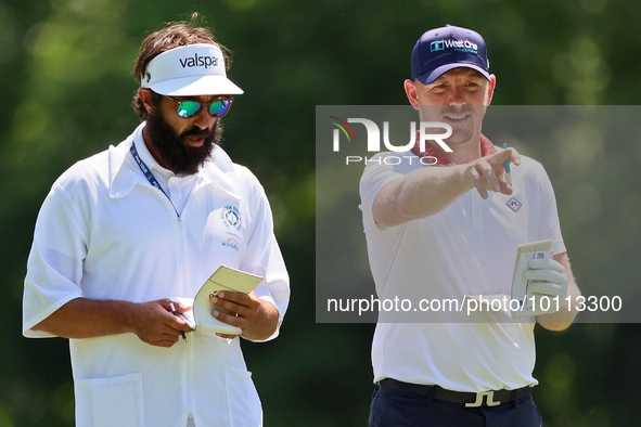 Matt Wallace of England looks down the 15th fairway during the first round of the The Memorial Tournament presented by Workday at Muirfield...