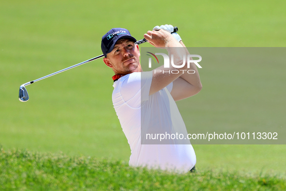 Matt Wallace of England hits from the bunker on the 15th fairway during the first round of the The Memorial Tournament presented by Workday...