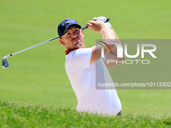 Matt Wallace of England hits from the bunker on the 15th fairway during the first round of the The Memorial Tournament presented by Workday...