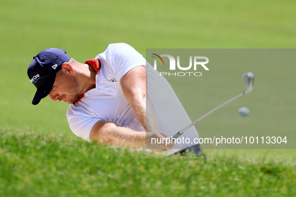 Matt Wallace of England hits from the bunker on the 15th fairway during the first round of the The Memorial Tournament presented by Workday...