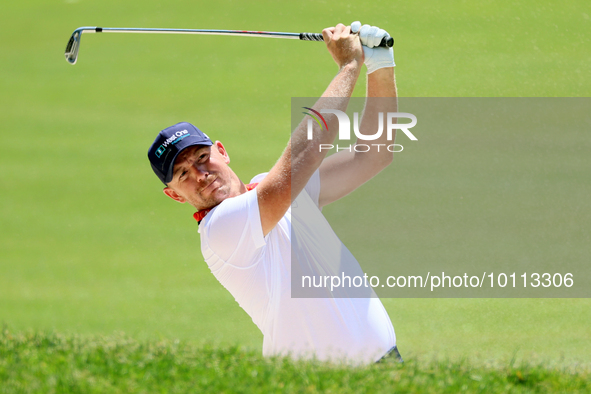 Matt Wallace of England hits from the bunker on the 15th fairway during the first round of the The Memorial Tournament presented by Workday...