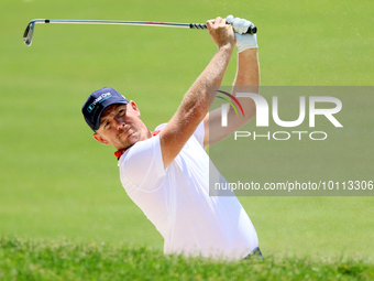 Matt Wallace of England hits from the bunker on the 15th fairway during the first round of the The Memorial Tournament presented by Workday...